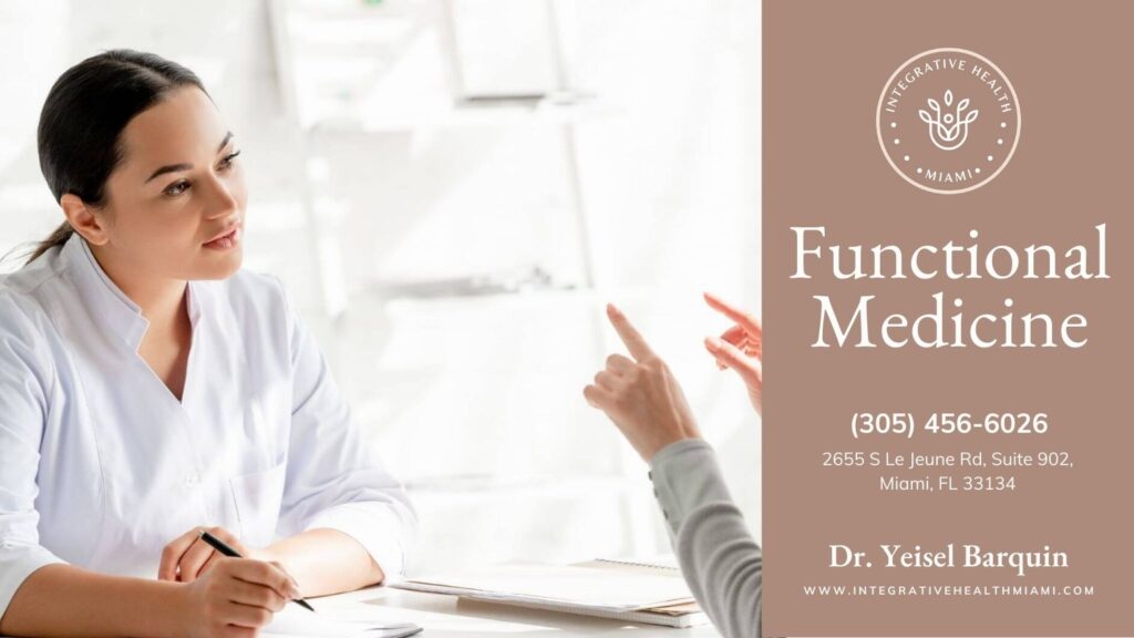 A doctor attentively listens to a patient, symbolizing the personalized care offered in functional medicine.