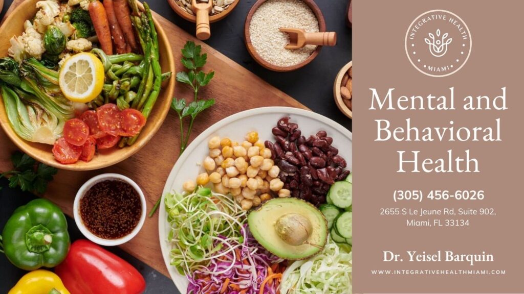 A plate of colorful, nutritious food on a table, symbolizing the role of diet in mental & behavioral health.